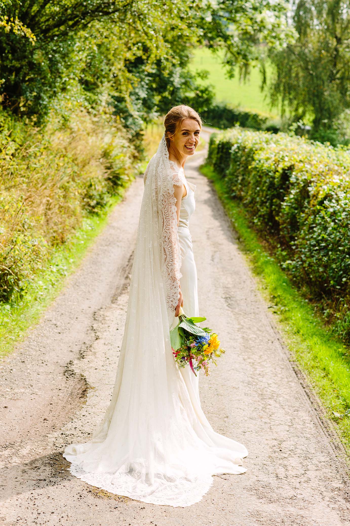 Eleganza Real Bride Kirsty Wearing Suzanne Neville Image