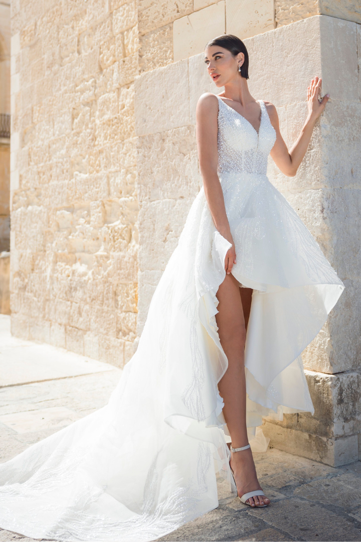 Model wearing a white Eleganza Iconica Wedding Dress in Glasgow UK