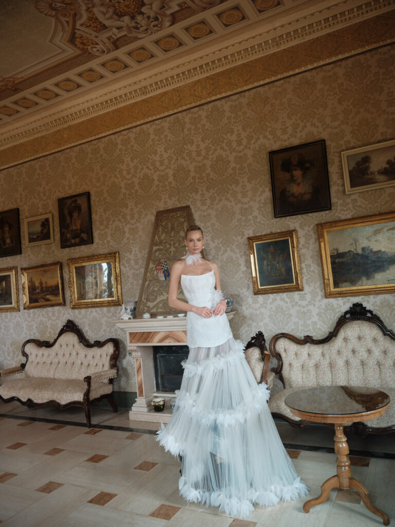 Dolcezza wedding dress full front view with detachable skirt and soft tiered silhouette