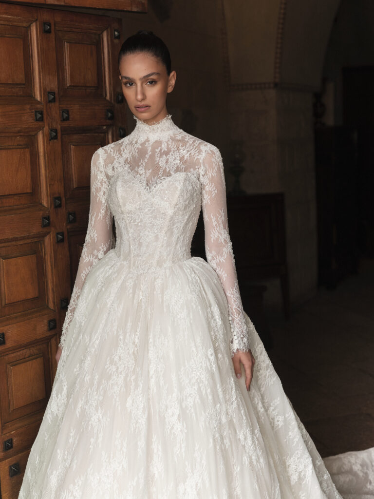 Cuore di Sposa bridal gown front view with floral lace bodice, long sleeves and full skirt