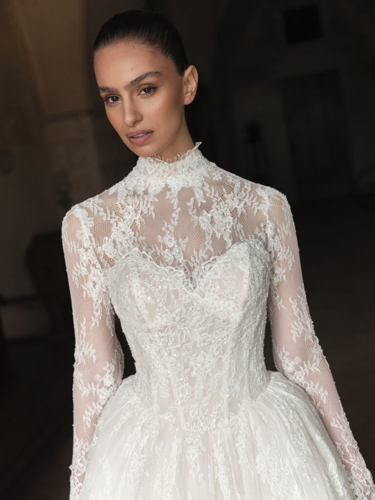 Cuore di Sposa wedding dress close-up showing sweetheart neckline beneath high-neck lace bodysuit