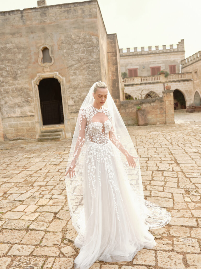 Anima Mia bridal gown full silhouette with long sleeves and soft flowing tulle skirt