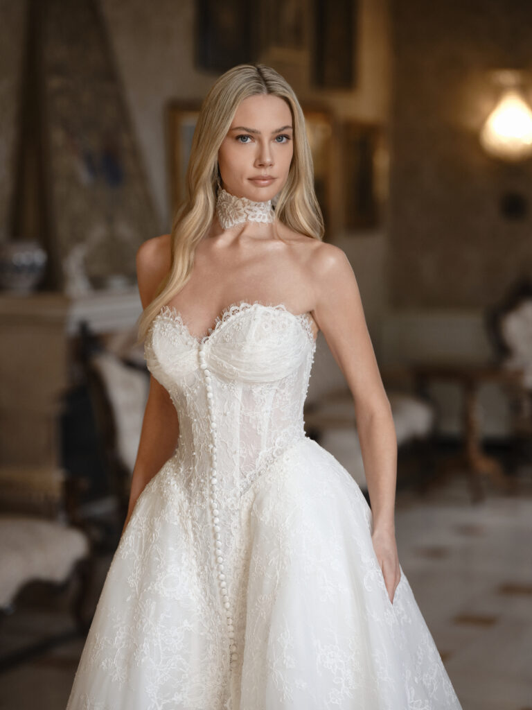 Affetto wedding dress side view with strapless bodice and full skirt