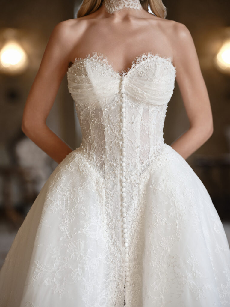 Affetto wedding dress full view showing voluminous skirt and lace texture