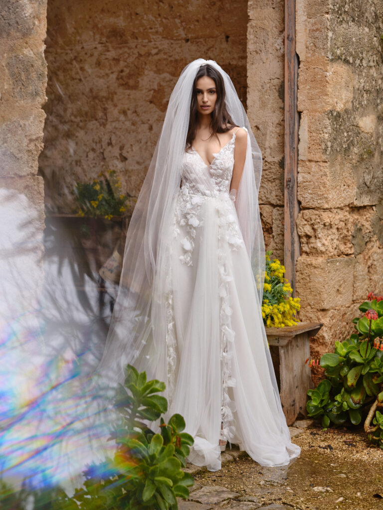 Tesoro Mia bridal gown full length with flowing tulle skirt and soft veil