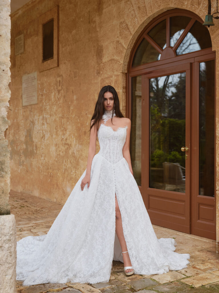 Romantica wedding dress full front view with floral lace, corset bodice and subtle front slit