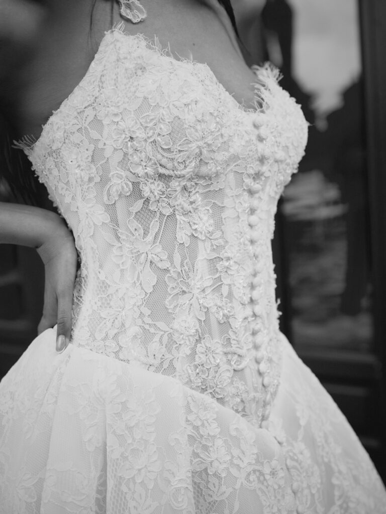 Romantica wedding dress back view showing full A-line skirt and sweeping lace train